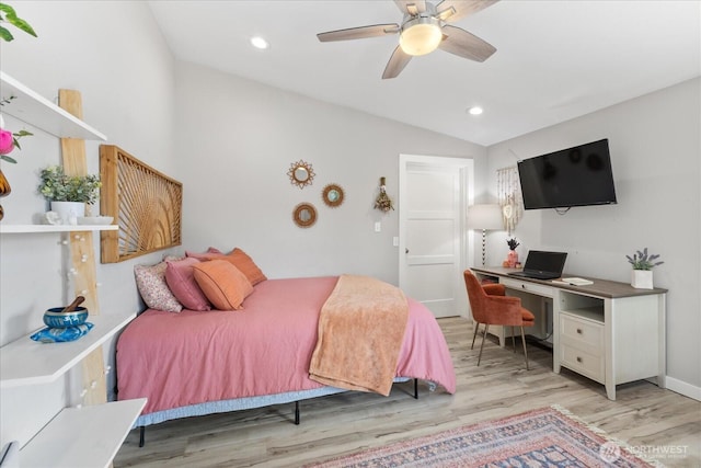 15208 W Lake Goodwin Rd, Stanwood, WA 98292 - bedroom with vaulted ceiling, light wood-style flooring, an office area, ceiling fan, and recessed lighting