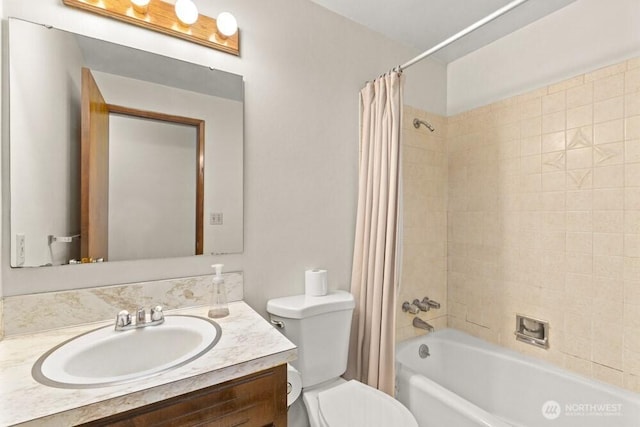 full bath with toilet, vanity, and shower / bathtub combination with curtain