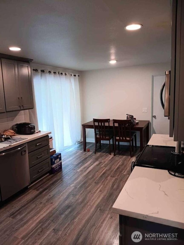 11705 Silver Way, Everett, WA 98208 - kitchen with stainless steel dishwasher, dark wood-style floors, and recessed lighting