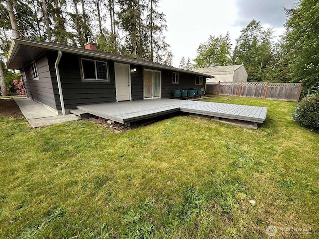 11705 Silver Way, Everett, WA 98208 - rear view of property featuring a wooden deck and a chimney