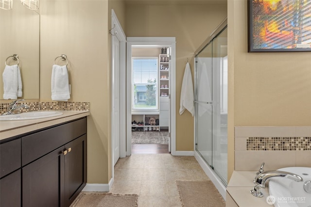 13708 Big Sky Dr E, Bonney Lake, WA 98391 - full bath featuring a shower stall, vanity, a bath, and baseboards