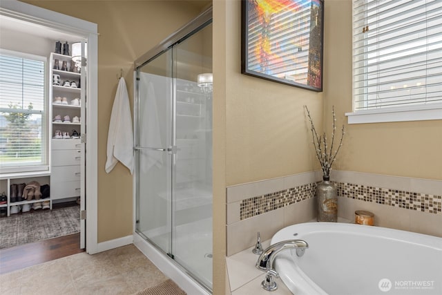 13708 Big Sky Dr E, Bonney Lake, WA 98391 - bathroom with a shower stall and a garden tub