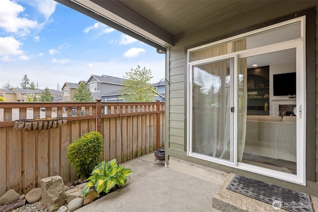 13708 Big Sky Dr E, Bonney Lake, WA 98391 - view of patio / terrace with a residential view and fence