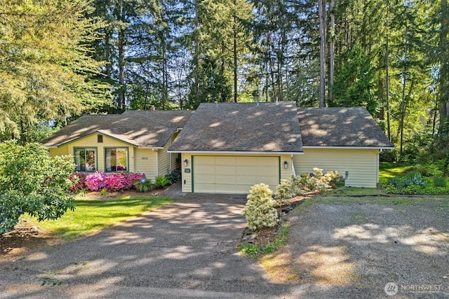 3912 Sutherland St, Gig Harbor, WA 98332 - ranch-style home with a garage and asphalt driveway