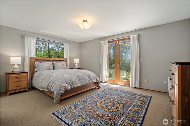 3912 Sutherland St, Gig Harbor, WA 98332 - carpeted bedroom featuring access to exterior and baseboards