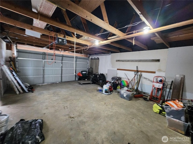 garage featuring a garage door opener