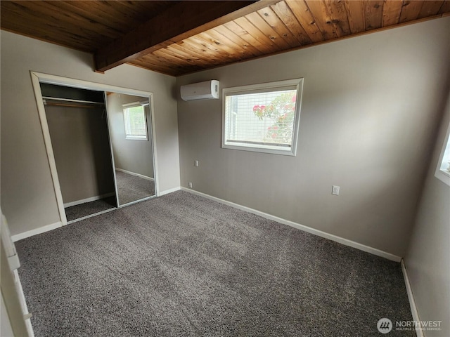 unfurnished bedroom featuring wooden ceiling, a wall mounted AC, carpet flooring, baseboards, and beamed ceiling