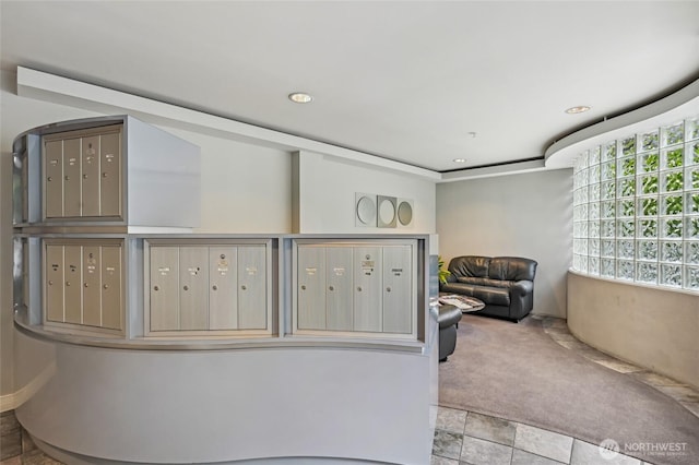 view of property's community with mail area and recessed lighting