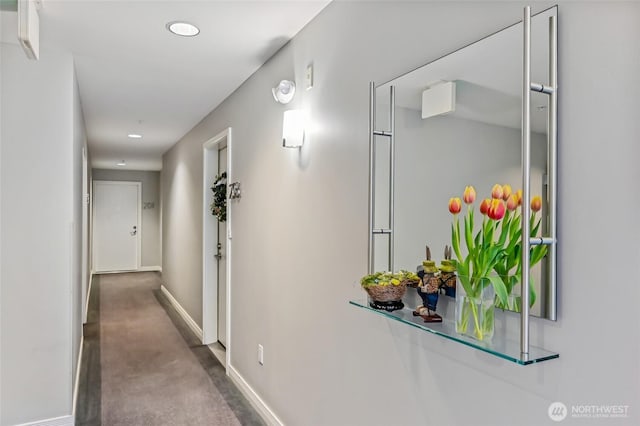 hall featuring carpet, baseboards, and recessed lighting