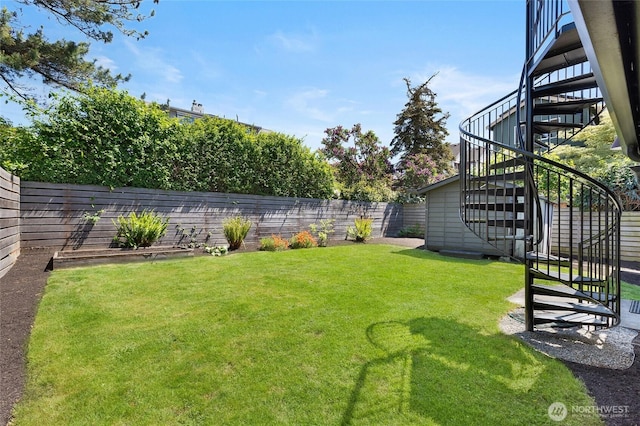 view of yard featuring stairway