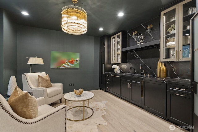 6993 N Fork Rd SE, Snoqualmie, WA 98065 - living area featuring light wood-style floors, recessed lighting, and a chandelier