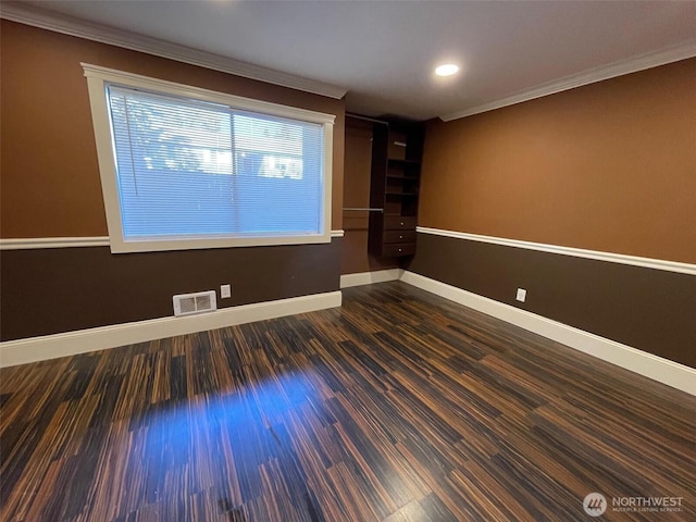 11717 93rd Ave NE Unit A7, Kirkland, WA 98034 - unfurnished room with ornamental molding, baseboards, wood finished floors, and recessed lighting