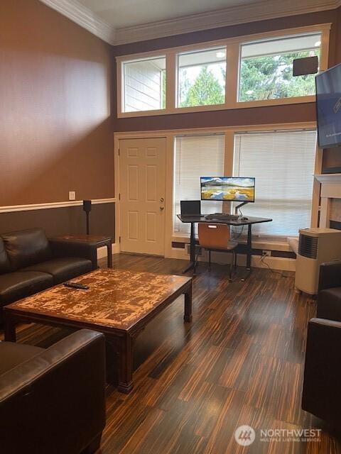 11717 93rd Ave NE Unit A7, Kirkland, WA 98034 - living area featuring crown molding, plenty of natural light, and wood finished floors
