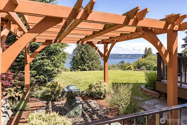 7353 Cedar House Ct, Clinton, WA 98236 - view of grassy yard featuring a water view and a pergola