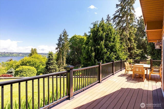 7353 Cedar House Ct, Clinton, WA 98236 - wooden terrace with a lawn, outdoor dining area, and a water view