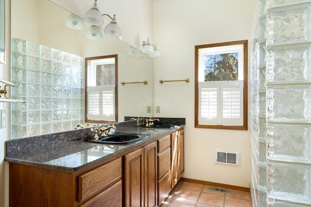 7353 Cedar House Ct, Clinton, WA 98236 - full bath with tile patterned floors, double vanity, and baseboards