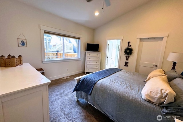 81 E Sullivan St, Allyn, WA 98524 - bedroom with dark colored carpet, vaulted ceiling, baseboards, and ceiling fan
