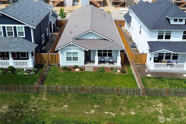 81 E Sullivan St, Allyn, WA 98524 - view of front of house with a residential view, central AC unit, and a patio area