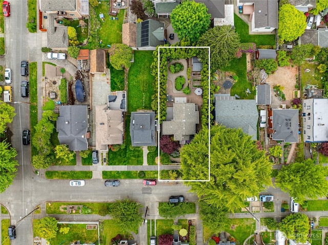 aerial view of residential area with property parcel outlined