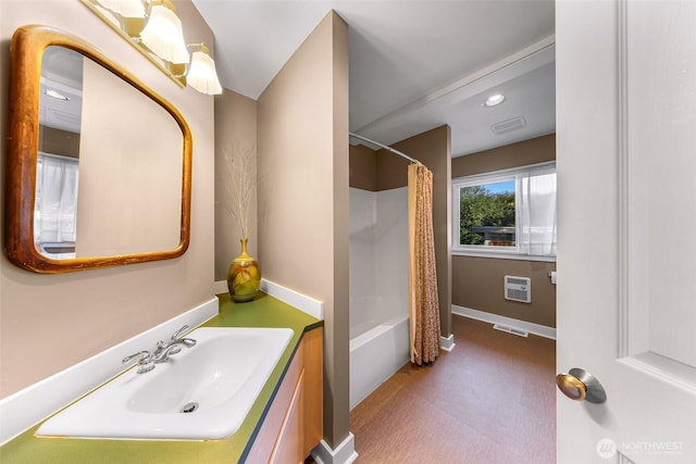 2333 Tuttle Ln, Lummi Island, WA 98262 - full bathroom with vanity, an AC wall unit, and shower / bath combination with curtain