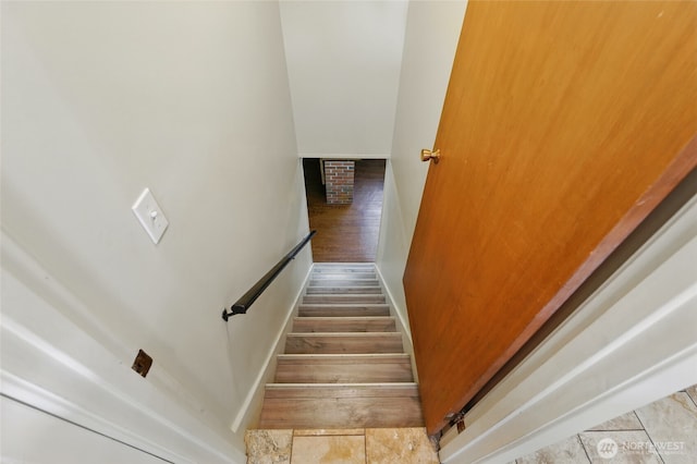 stairway with baseboards