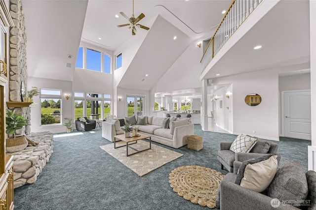 325 Island Green Way, Lynden, WA 98264 - carpeted living area featuring a ceiling fan, a high ceiling, and recessed lighting