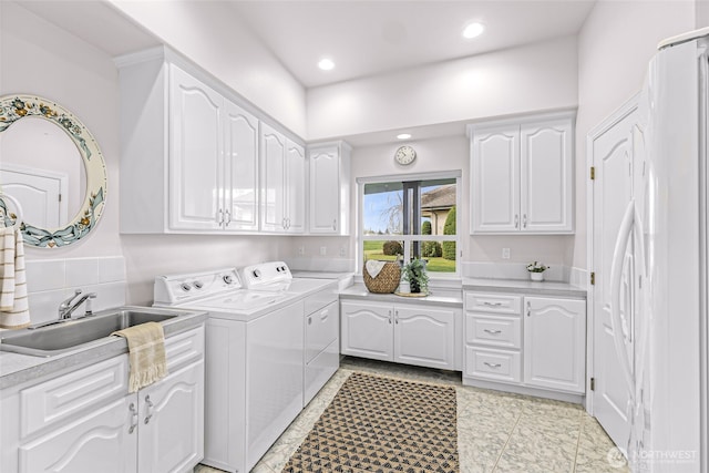 325 Island Green Way, Lynden, WA 98264 - clothes washing area with cabinet space, washing machine and dryer, and recessed lighting