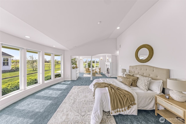 325 Island Green Way, Lynden, WA 98264 - carpeted bedroom featuring arched walkways, recessed lighting, baseboards, and high vaulted ceiling