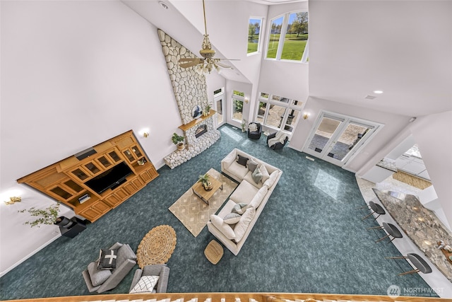 325 Island Green Way, Lynden, WA 98264 - living area featuring carpet flooring, a towering ceiling, ceiling fan, and french doors