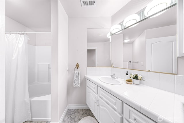 325 Island Green Way, Lynden, WA 98264 - bathroom featuring vanity, baseboards, shower / bath combination with curtain, and marble look tile flooring
