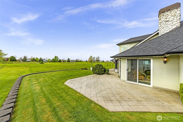 325 Island Green Way, Lynden, WA 98264 - view of grassy yard featuring a patio area