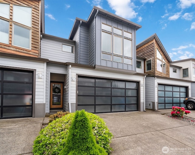12313 NE 116th St N, Vancouver, WA 98682 - view of front of home featuring an attached garage and concrete driveway
