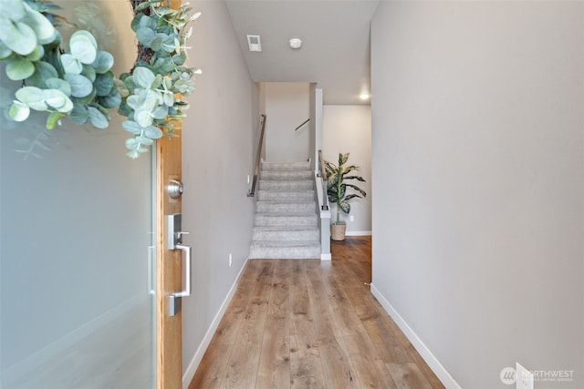 12313 NE 116th St N, Vancouver, WA 98682 - foyer entrance with stairs, wood finished floors, and baseboards