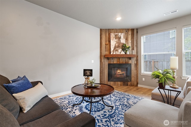 12313 NE 116th St N, Vancouver, WA 98682 - living room with wood finished floors, a fireplace, baseboards, and recessed lighting