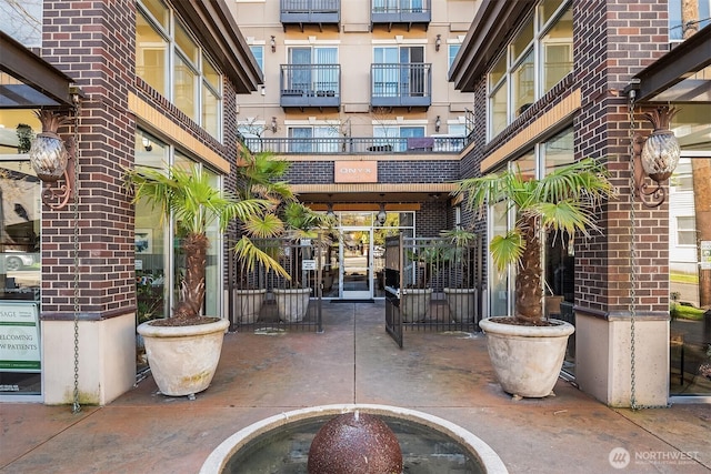 1125 E Olive St Unit 501, Seattle, WA 98122 - property entrance featuring brick siding