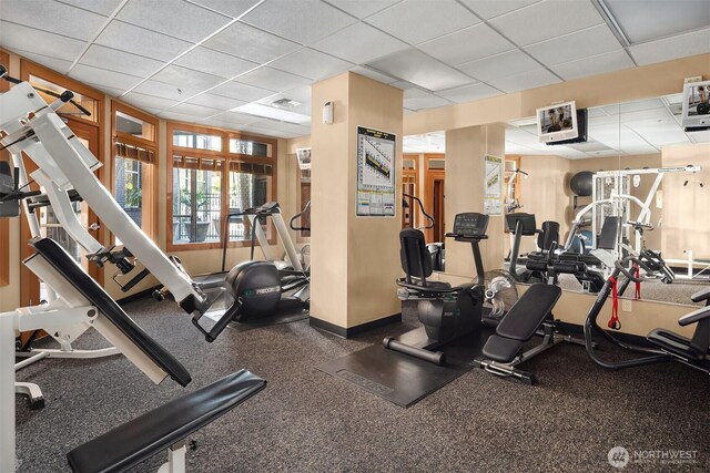 1125 E Olive St Unit 501, Seattle, WA 98122 - gym featuring a drop ceiling and baseboards