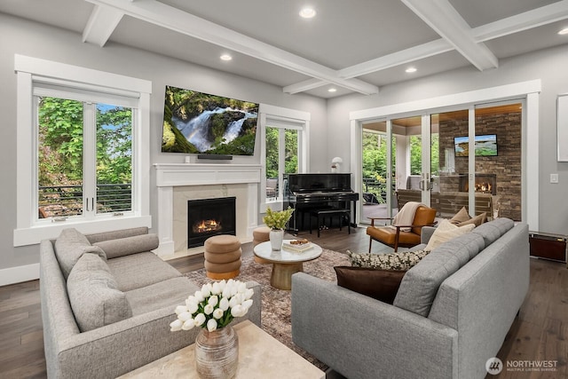 living room featuring a fireplace, healthy amount of natural light, beam ceiling, dark wood-style flooring, and coffered ceiling