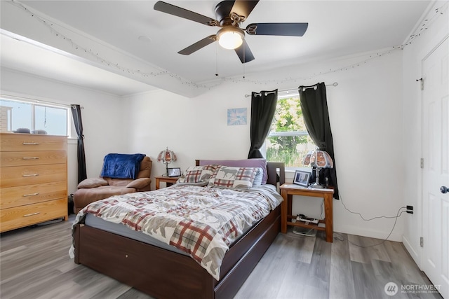 337 100th St S, Tacoma, WA 98444 - bedroom featuring light wood-style flooring, a ceiling fan, and baseboards