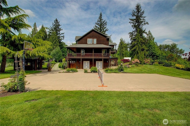 26901 15th Ave NE, Arlington, WA 98223 - rear view of property with a yard and a wooden deck