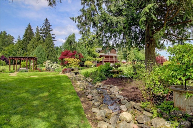 26901 15th Ave NE, Arlington, WA 98223 - view of grassy yard featuring a pergola