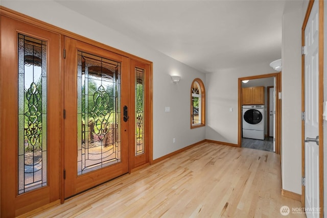 26901 15th Ave NE, Arlington, WA 98223 - foyer with washer / clothes dryer and light wood-type flooring