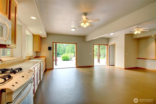 26901 15th Ave NE, Arlington, WA 98223 - kitchen featuring white appliances, ceiling fan, concrete floors, recessed lighting, and light countertops