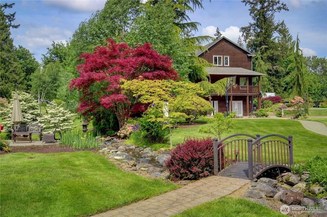 26901 15th Ave NE, Arlington, WA 98223 - view of green lawn featuring a balcony