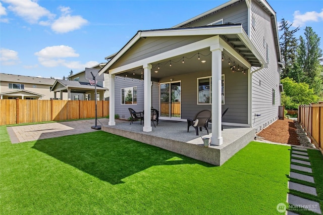 rear view of house featuring a patio