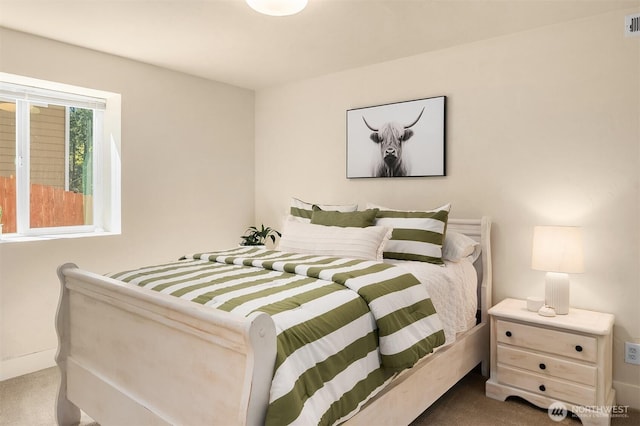 bedroom featuring carpet