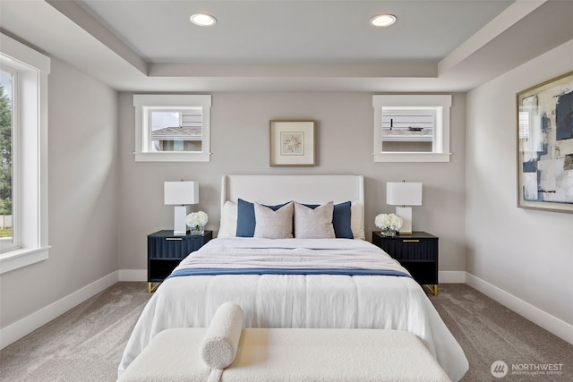 20022 7th Ave SE, Bothell, WA 98012 - carpeted bedroom with baseboards, a tray ceiling, and recessed lighting