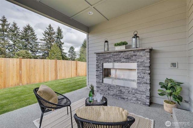 20022 7th Ave SE, Bothell, WA 98012 - view of patio with an outdoor stone fireplace