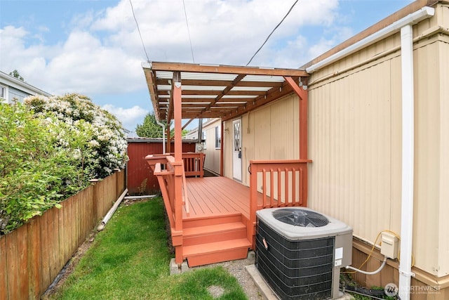 5705 113th Ave E Unit 68, Puyallup, WA 98372 - deck featuring central AC unit and a fenced backyard
