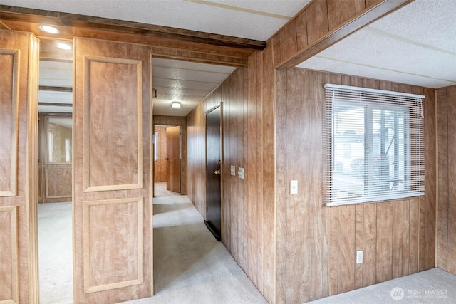 5705 113th Ave E Unit 68, Puyallup, WA 98372 - hall featuring light carpet and wood walls