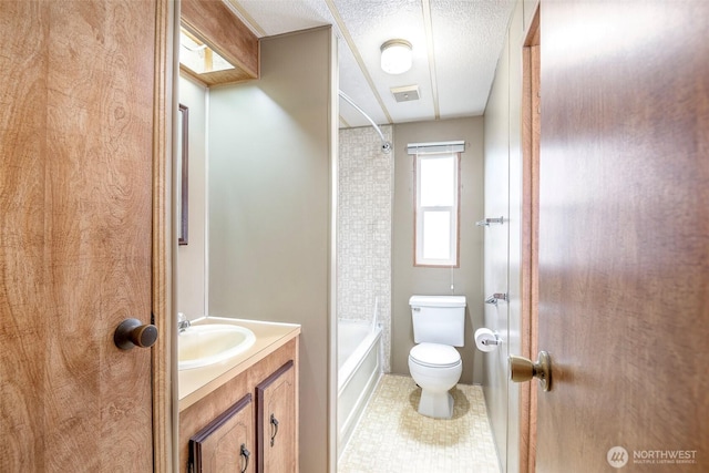 5705 113th Ave E Unit 68, Puyallup, WA 98372 - full bath with toilet, bathing tub / shower combination, a textured ceiling, vanity, and tile patterned flooring